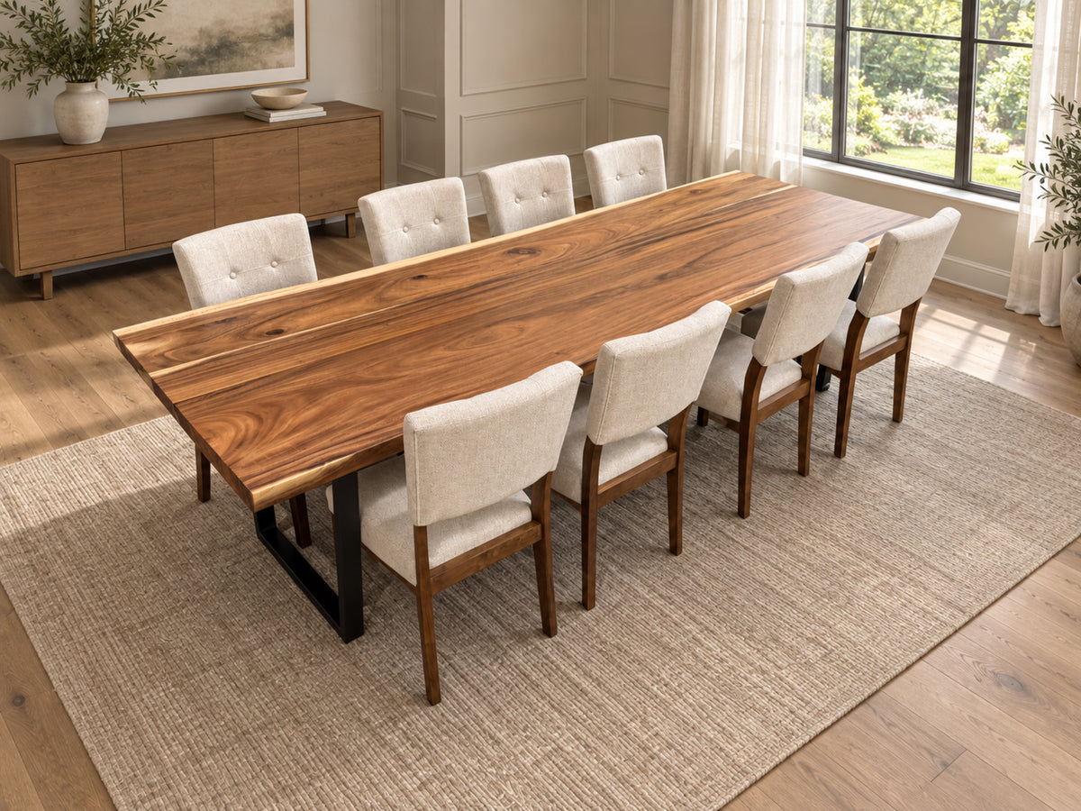 Natural live edge dining table with eight cream upholstered chairs in a digitally staged dining room